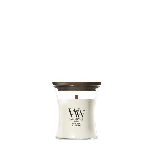 White Teak scented candle by WoodWick